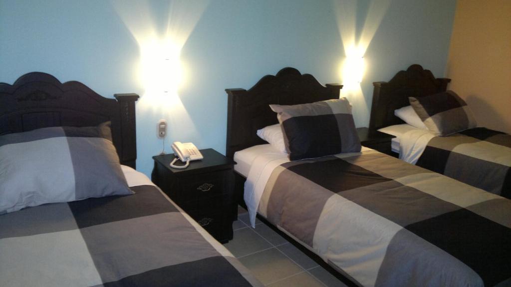 Hotel Eskalima Alajuela Zimmer foto